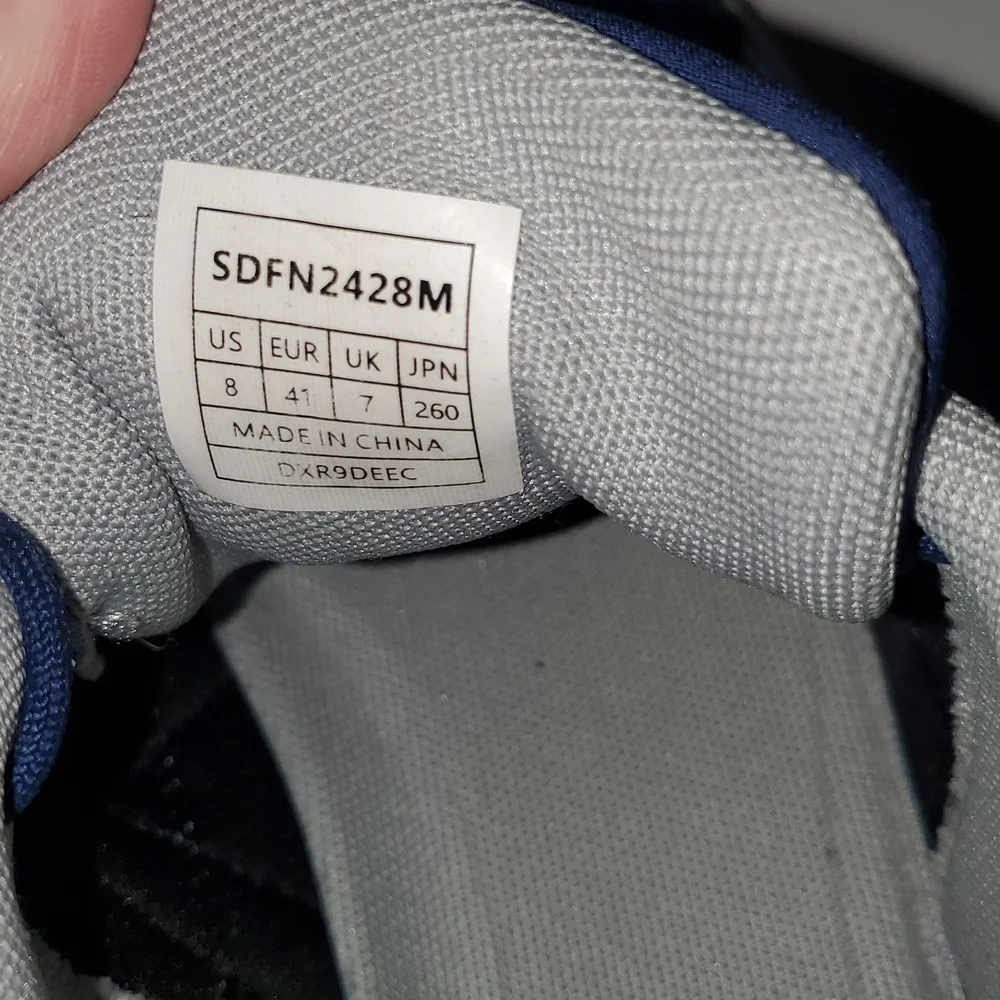 BURUDANI men's athletic running shoes in a blue color with white midsole Size 8